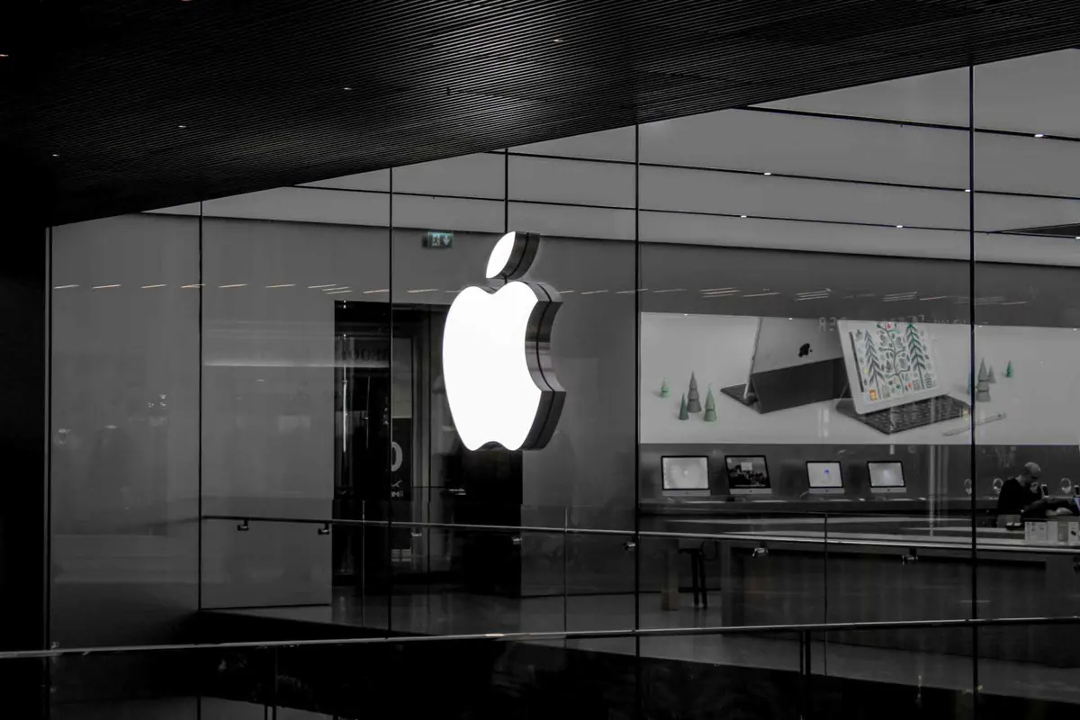 Apple Intelligence logo on a dark background representing the AI service receiving regulatory approval in China