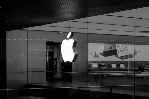 Apple Intelligence logo on a dark background representing the AI service receiving regulatory approval in China