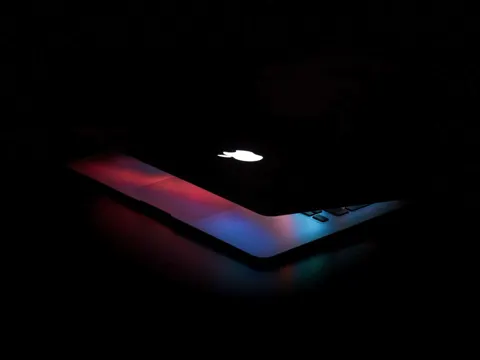 Concept render of Apple's MacBook Ultra laptop showing a thin profile, OLED display, and Dynamic Island camera cutout replacing the notch