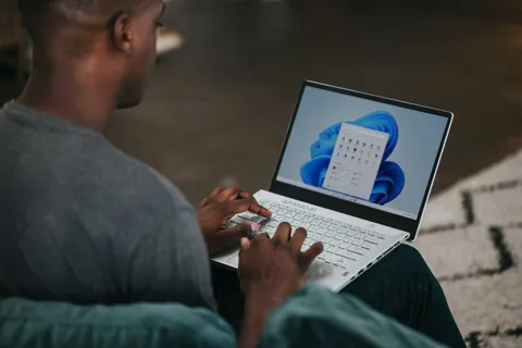 Microsoft MDASH multi-model AI security harness scanning Windows code commits for vulnerabilities in real time