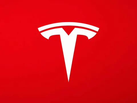 Tesla Model 3 with Tesla logo - 10 millionth EV production milestone July 2026